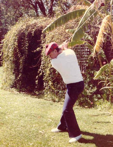 Dave McFarnell practicing his golf swing